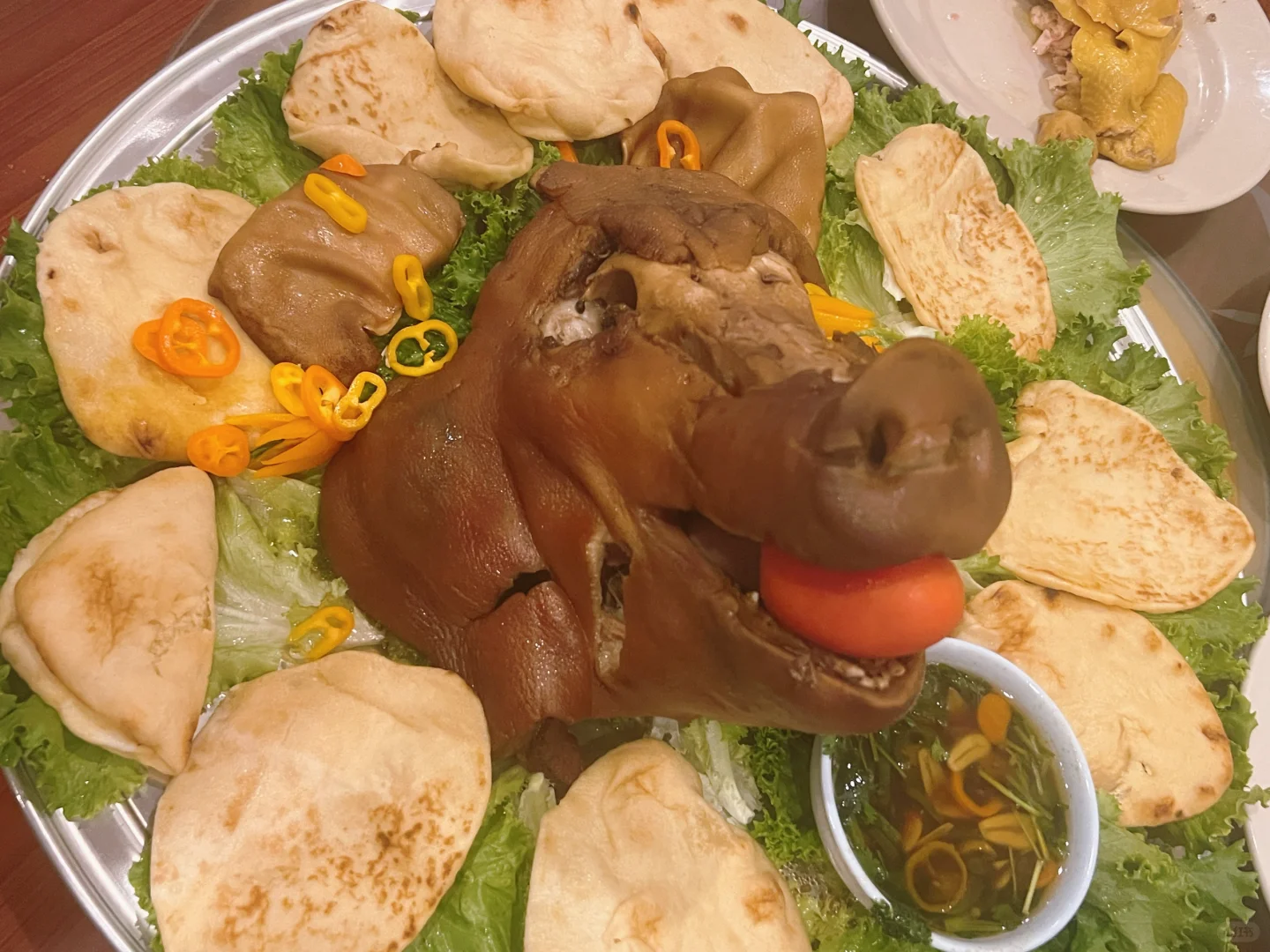 "Feast on a Whole Roasted Pig Head in Austin – Aromatic and Unforgettable!"